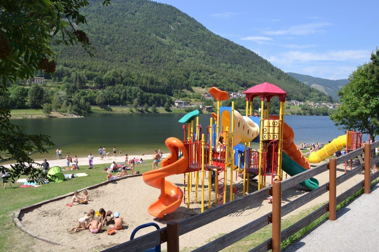 Beach and children's playground on the lake shore